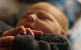 Новорожденный младенец