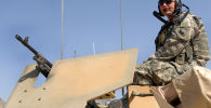 5 марта 2007 г., американский солдат во время патрулирования Международных сил содействия безопасности (ISAF) под руководством НАТО в провинции Фарах в Афганистане. Война в Афганистане, начавшаяся после терактов 11 сентября, унесла жизни десятков тысяч афганцев и около 2400 американских солдат