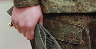 Архивное фото военнослужащего с ремнем