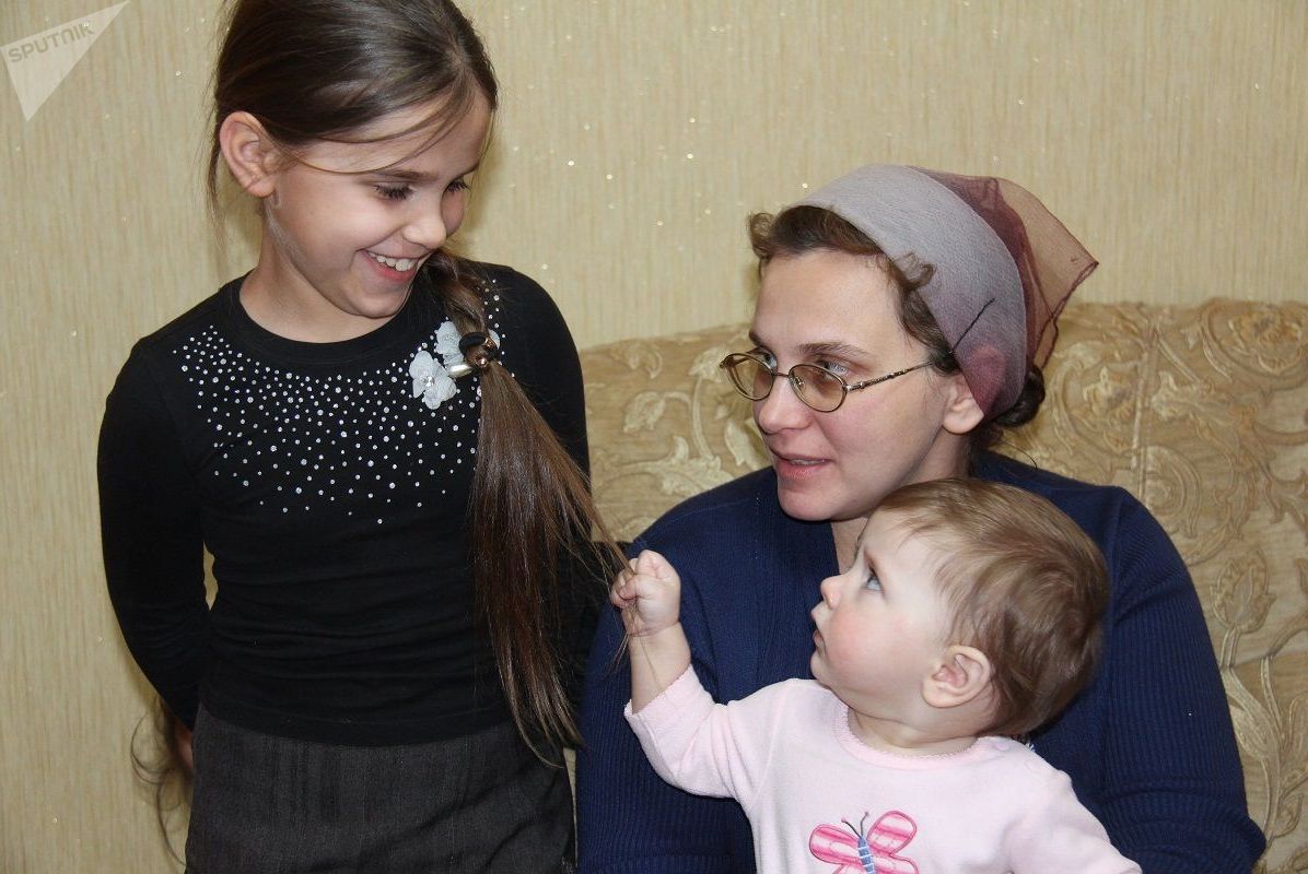 Мама в 15 раз. Самая многодетная семья Казахстана. Семья Кадзаевых 15 ребенок.