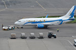 Пассажирский самолет казахстанской авиакомпании SCAT (СКАТ) в аэропорту, архивное фото