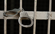 Наручники, архивное фото Наручники, архивное фото