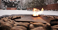 Вечный огонь мемориала Славы в парке им. 28 гвардейцев-панфиловцев в Алматы
