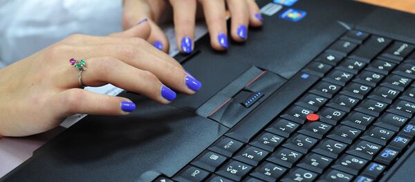 Архивное фото работы за компьютером Архивное фото работы за компьютером - Sputnik Казахстан