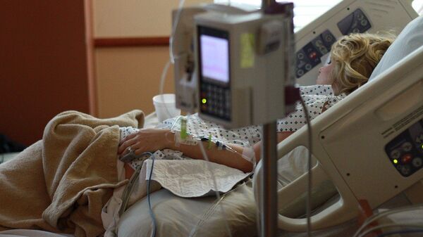 Беременная женщина в больничной палате, иллюстративное фото - Sputnik Казахстан