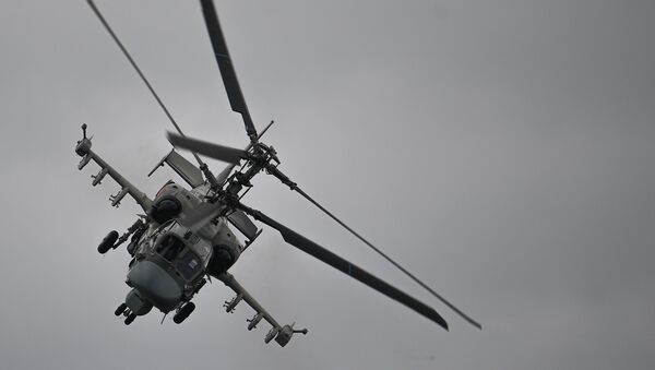 Ударный вертолет Ка-52 Аллигатор выполняет демонстрационный полет в рамках Международного форума Армия-2020 на аэродроме Кубинка в Подмосковье - Sputnik Казахстан