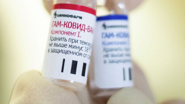 Ампулы с вакциной против коронавируса  - Sputnik Казахстан