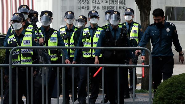 Полицейские в Южной Корее  - Sputnik Казахстан