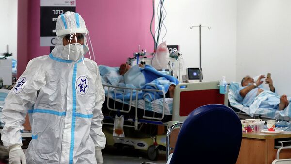 Врач в больнице с коронавирусом - Sputnik Казахстан