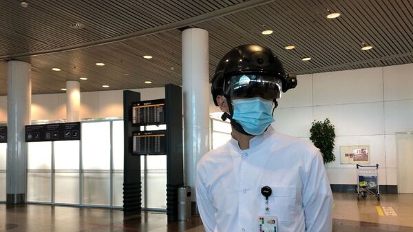 В аэропорту столицы тестируют смарт-шлем со встроенным тепловизором - Sputnik Казахстан