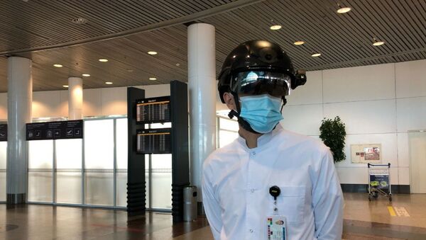 В аэропорту столицы тестируют смарт-шлем со встроенным тепловизором - Sputnik Казахстан