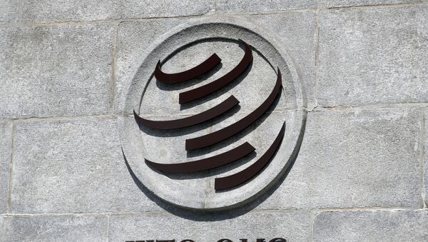 Логотип ВТО на здании штаб-квартиры организации  - Sputnik Казахстан