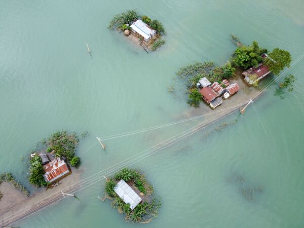 Последствия наводнения, вызванного муссонными дождями в Сунамгандже, Бангладеш - Sputnik Казахстан