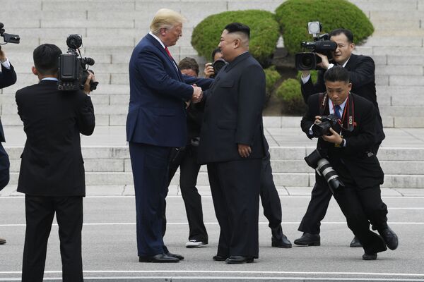 Встреча Трампа и Ким Чен Ына в КНДР - Sputnik Казахстан