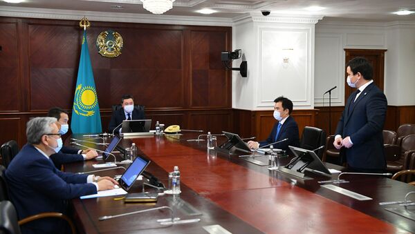 Аскар Мамин представил нового министра национальной экономики Асета Иргалиева   - Sputnik Казахстан