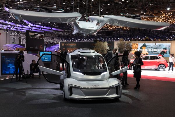 Концептуальный беспилотный летающий электромобиль компаний Audi AG, Airbus и ItalDesign Giugiaro - Sputnik Казахстан