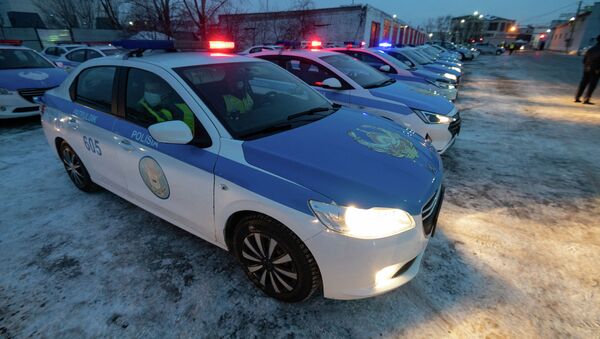 Патрульные полицейские машины готовятся выехать на дежурство - Sputnik Қазақстан
