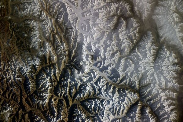 Вид из космоса на горный массив Каракорум, снятый российским космонавтом Сергеем Кудь-Сверчковым с МКС - Sputnik Қазақстан