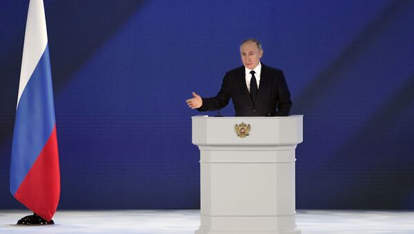 Президент РФ Владимир Путин во время выступления с ежегодным посланием Федеральному Собранию - Sputnik Казахстан