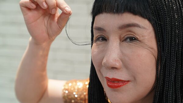 Китаянка Ю Цзянься является рекордсменкой Книги Гиннесса по длине ресниц - Sputnik Казахстан