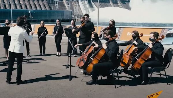 Оркестр из Сибири сыграл на ГЭС - видео - Sputnik Казахстан