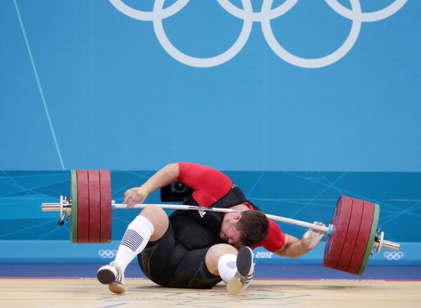 Матиас Штайнер в соревнованиях по тяжелой атлетике среди мужчин в весовой категории свыше 105 кг на ХХХ летних Олимпийских играх в Лондоне - Sputnik Казахстан