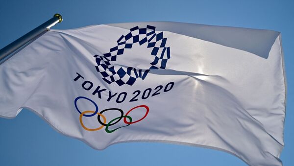 Флаг Олимпийских Игр в Токио  - Sputnik Қазақстан
