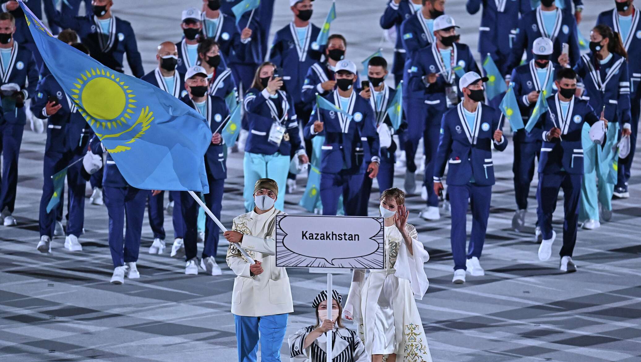 Qfl казахстан. Олимпийские игры в Токио 2020. Олимпийские игры в Токио 2021. Флаг Казахстана на Олимпиаде. Казахстанские спортсмены на Олимпийских играх.