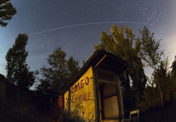 МКС пролетает над бомбоубежищем в Донецке. - Sputnik Казахстан