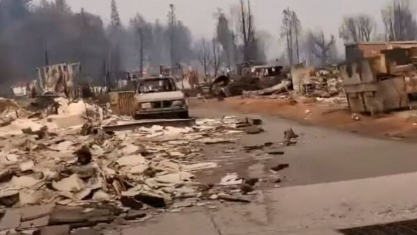 Город  в Калифорнии превратился в руины после разрушительного пожара - видео - Sputnik Қазақстан