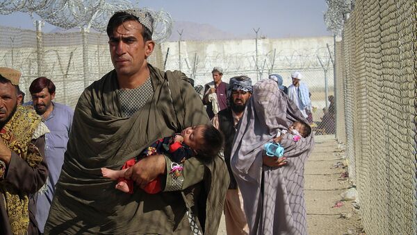 Афганские беженцы пытаются покинуть страну через границу с Пакистаном - Sputnik Казахстан