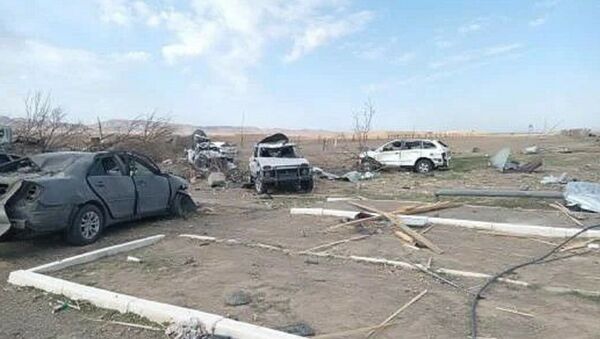 Последствия взрывов в ближайших к воинской части, в которой произошло ЧП - Sputnik Казахстан