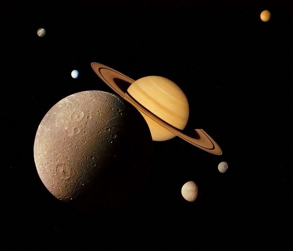 Вояджер-1 ғарыш кемесі түсірген Сатурн бейнесі - Sputnik Қазақстан