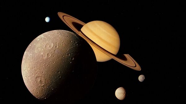 Снимки Диона и Сатурна, снятые зондом Вояджер-1 - Sputnik Казахстан