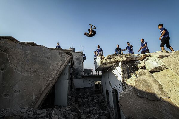 Снимок Паркур на руинах сирийского фотографа Мунеб Тайм, победивший в категории Спорт, одиночные фотографии конкурса имени Стенина  - Sputnik Казахстан