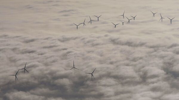 Ветряки над облаками в Шательро, Франция - Sputnik Казахстан