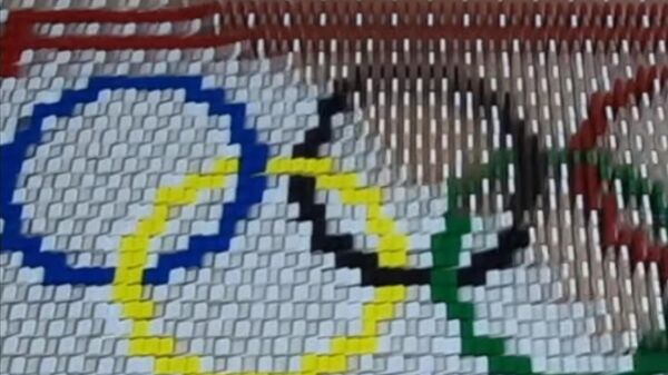 Олимпийские кольца из тысяч косточек домино - Sputnik Казахстан