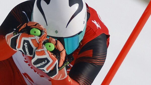 Китайский горнолыжник Янмин Чжан на XXIV зимних Олимпийских играх в Пекине - Sputnik Казахстан