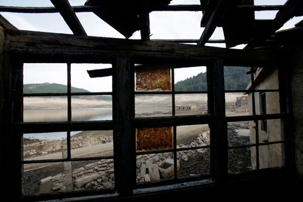 Виды деревни Асередо, затопленной 30 лет назад при строительстве водохранилища Альто-Линдозо. - Sputnik Казахстан