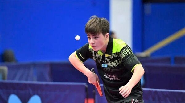 Алан Курмангалиев на турнире WTT Youth Contender по настольному теннису - Sputnik Казахстан