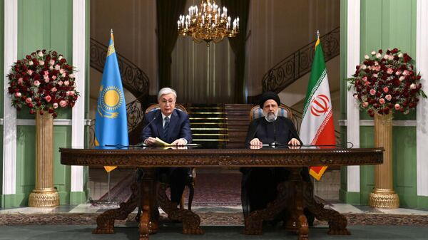 Президенты Казахстана и Ирана - Sputnik Казахстан