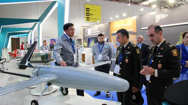 Казахстан презентовал продукцию отечественной оборонной промышленности на ADEX-2022 - Sputnik Казахстан