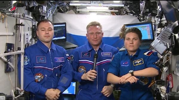 Российские космонавты поздравили казахстанцев с Днем Республики с борта МКС - Sputnik Казахстан