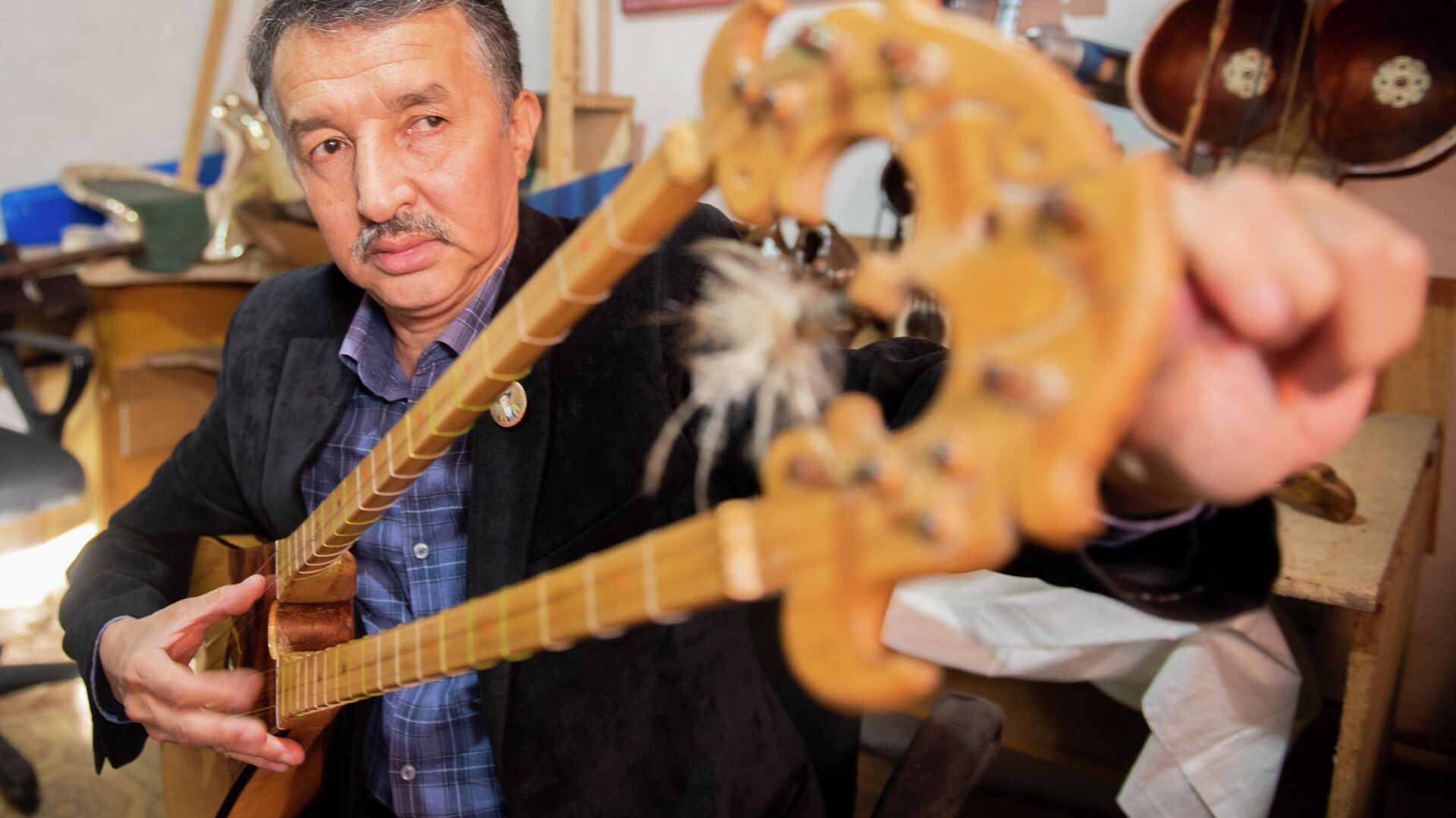 Дастан Ахмеди - исполнитель-исследователь музыкального инструмента коссаз - Sputnik Казахстан, 1920, 07.02.2023