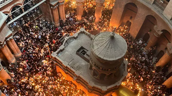 Благодатный огонь из Иерусалима привезли в полевой храм гвардейцев-мотострелков в зоне СВО