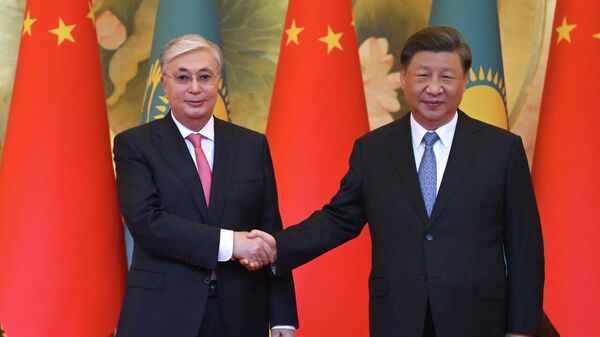 Главу государства Касым-Жомарта Токаева встретил Председатель КНР Си Цзиньпин - Sputnik Казахстан