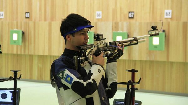 Казахстанский стрелок Ислам Сатпаев завоевал лицензию на участие в Олимпийских играх в Париже - Sputnik Казахстан