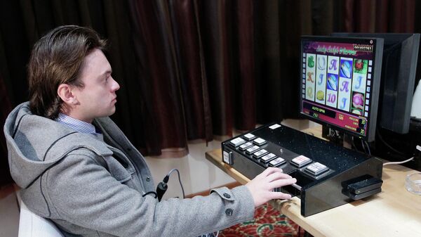 Игральный автомат в игровом клубе в букмекерской конторе  - Sputnik Казахстан