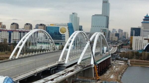 Астанадағы Есіл өзені арқылы өтетін LRT аспалы көпірінің құрылысы аяқталды - Sputnik Қазақстан