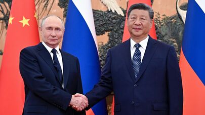 Владимир Путин и Си Цзиньпин во время встречи в Пекине